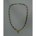 Gold necklace with bullhead pendant, red and gold beads
